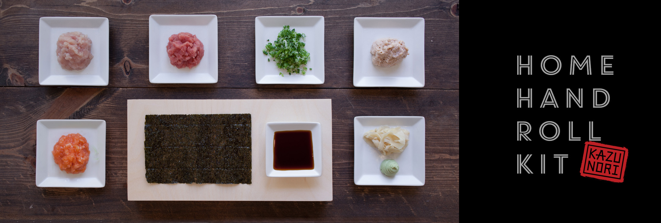 Home hand roll kit ingredients on white dishes